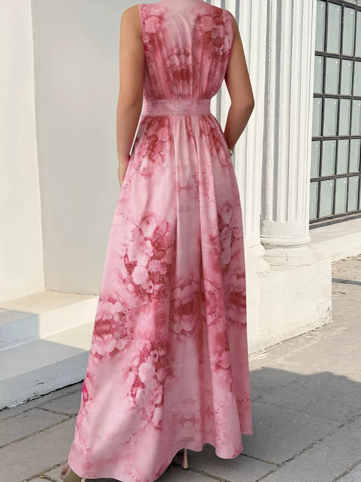 Back view of pink floral sleeveless maxi dress with gathered waist