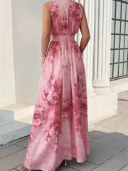 Back view of pink floral sleeveless maxi dress with gathered waist