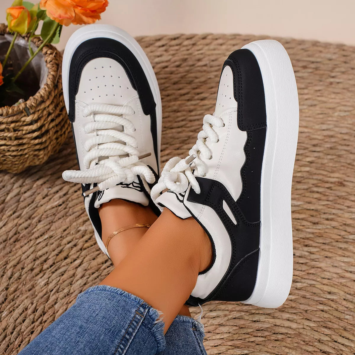 Top view of black and white platform sneakers