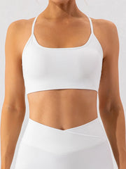 Front view of white ribbed spaghetti-strap active bra