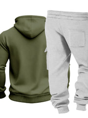 Back of olive hoodie and grey sweatpants displayed together with the trouser patch pocket visible