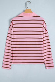 Back view of pink and brown striped shirt on a hanger.