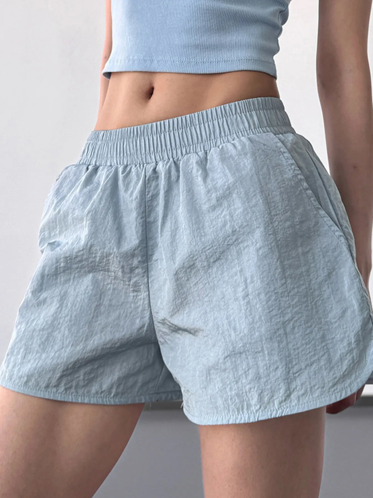Front view showing fit of elastic waist active shorts