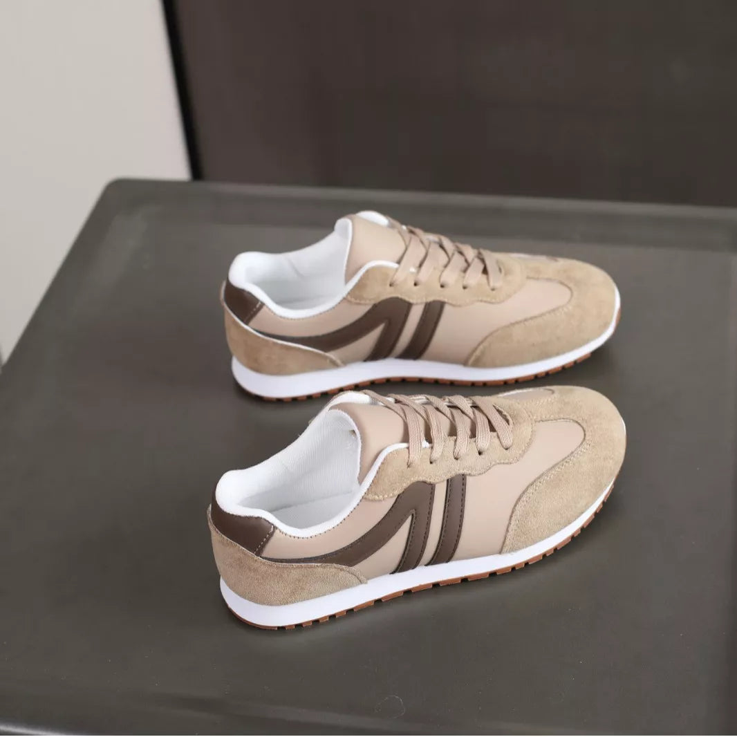 Beige striped lace-up sneakers in side view
