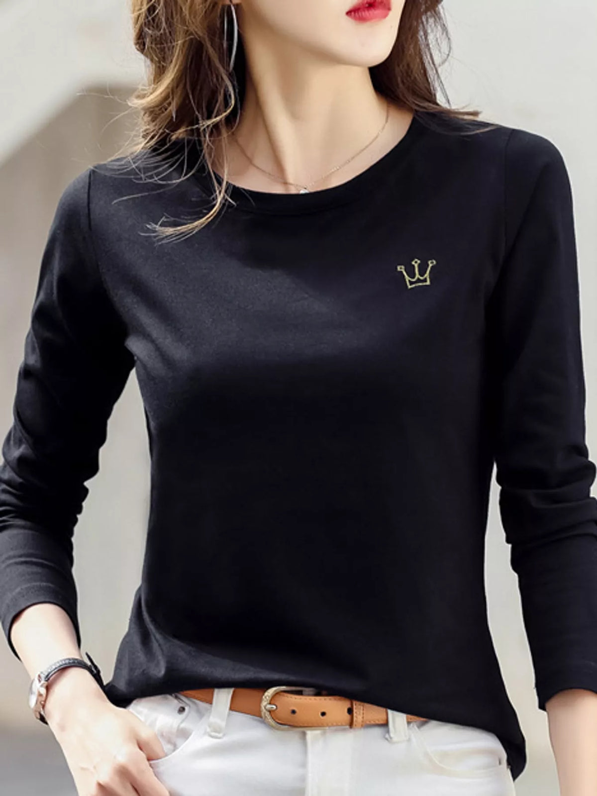 Black long-sleeve T-shirt with small crown embroidery, front view