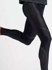 Side view of black active leggings in a running pose showing curved leg details