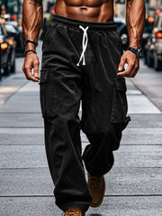 Model wearing corduroy cargo pants with a drawstring waist