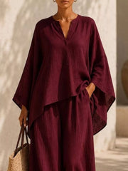 Closer view of the burgundy set showing the neckline and tied waist.