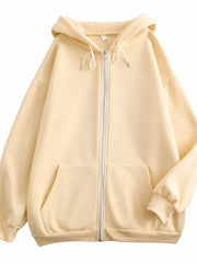 Front view of the cream oversized zip-up hoodie with hood and split kangaroo pockets