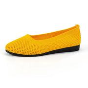 Yellow mesh flat slip-on in side profile