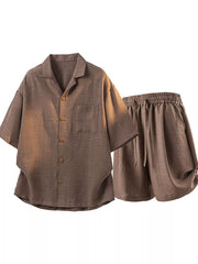 Brown button-up short-sleeve shirt and matching shorts displayed from the front.