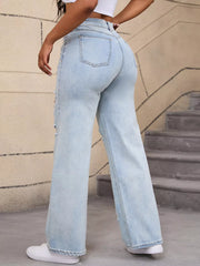 Rear three-quarter view of light-wash wide-leg jeans showing the back pocket shape