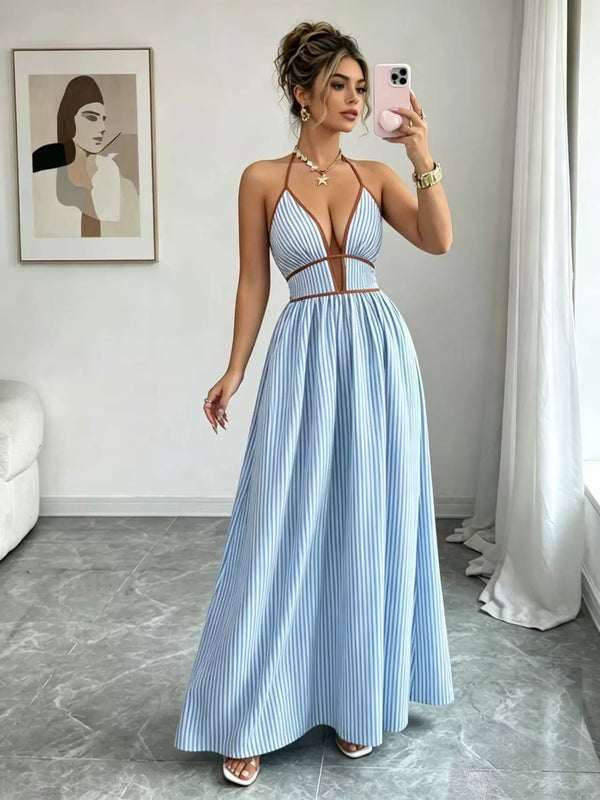 Light blue halter maxi dress with contrasting trim and gathered skirt, mirror view