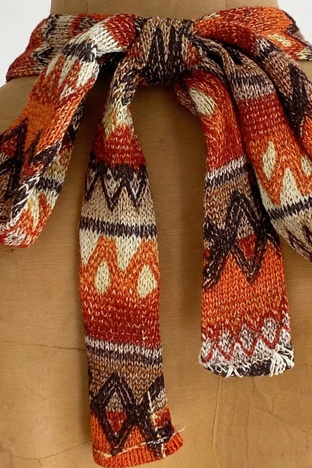 Close-up of patterned halter neck bow
