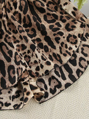 Leopard-print fabric draped to show its soft folds