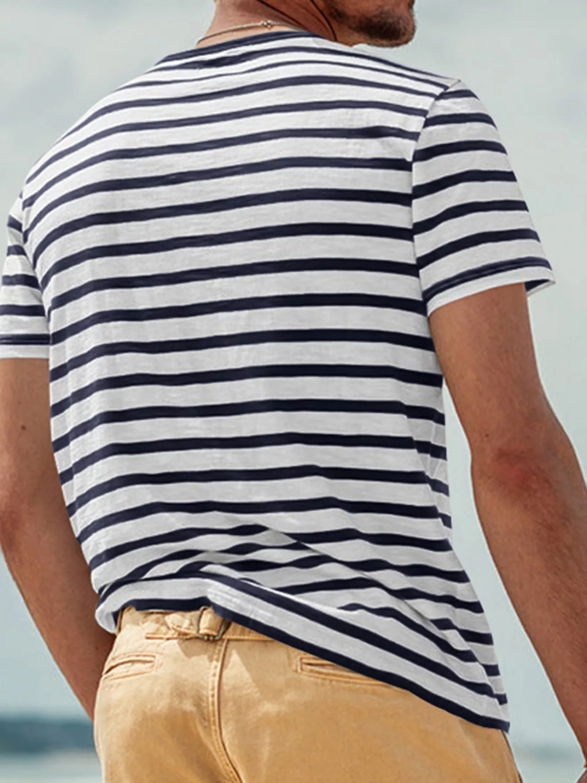 Back view of navy-and-white striped T-shirt