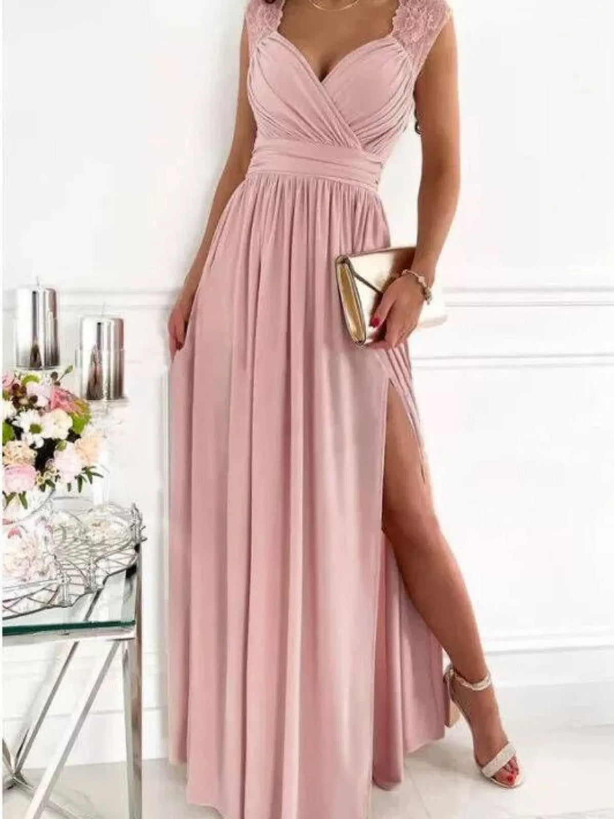 Dusty pink maxi dress with lace shoulder detail and high slit, front view