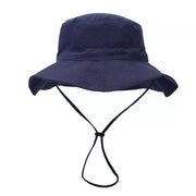 Front view of a navy bucket hat with a wide brim and dangling chin strap.