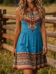 Blue sleeveless dress with tribal-print bodice and hem