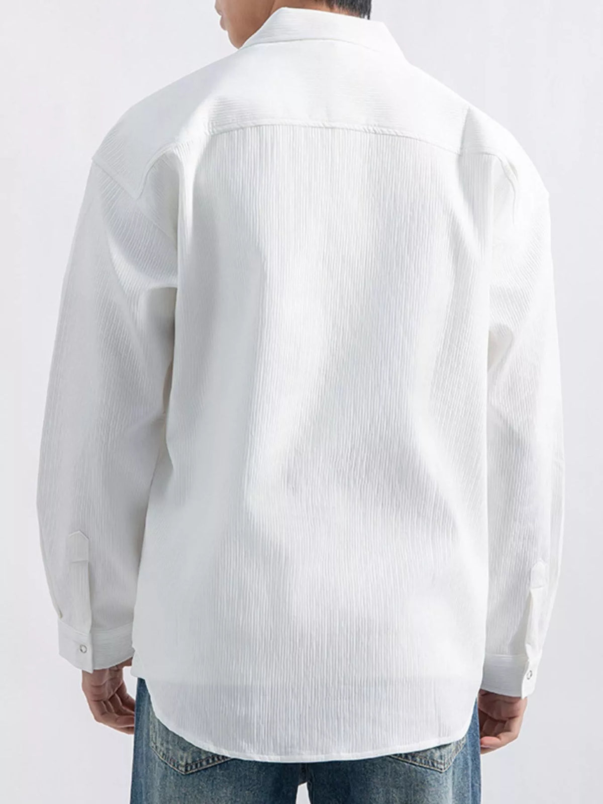 Back view of the white long-sleeve shirt