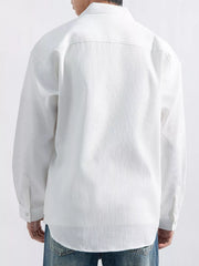 Back view of the white long-sleeve shirt