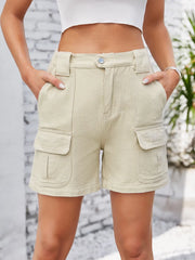Front view of pale beige washed denim shorts with large cargo pockets.