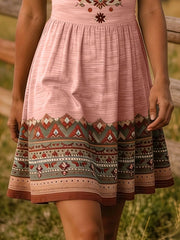 Close view of gathered pink skirt and patterned hem