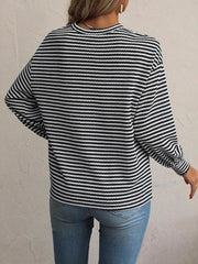 Back view of black-and-white striped top