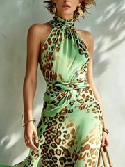 Close view of mint leopard print, halter neckline and waist detail