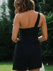 Back view of black one-shoulder mini dress with a single shoulder strap