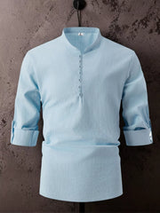 Light blue shirt with short button placket displayed on hanger