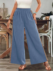 Blue wide-leg pants with embroidered side stripes