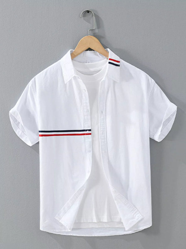 Back view of white short-sleeve shirt with red and navy collar stripe detail