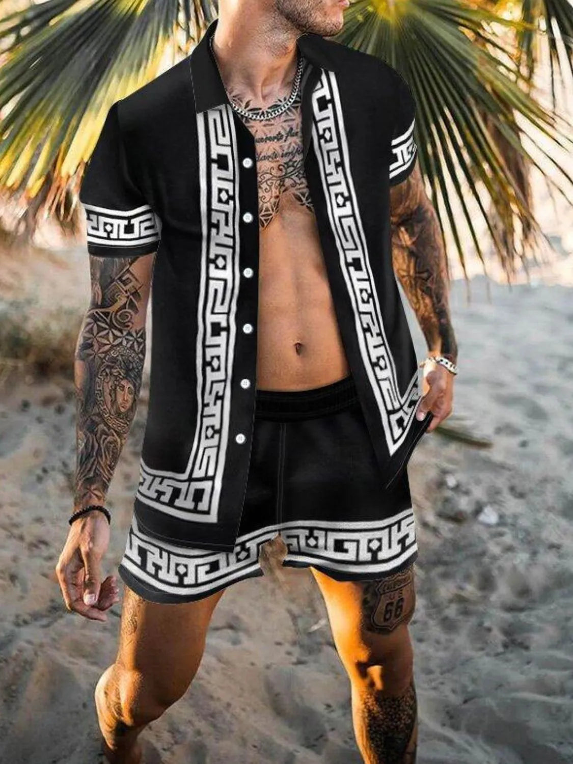 Model wearing black short-sleeve shirt and geometric-trim shorts