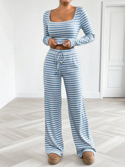 Model wearing matching blue striped square-neck top and wide-leg lounge pants
