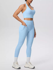 Back view of pale blue halter crop top and leggings