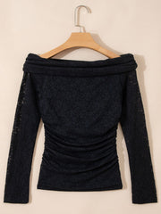 Front product view of black gathered off-shoulder top