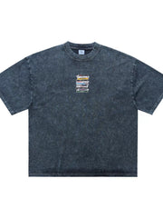 Front view of the blue vintage-wash T-shirt with cassette graphic