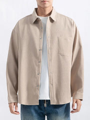 Back view of the textured button-down shirt on a model