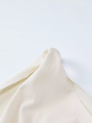 Close-up of ivory fabric drape detail