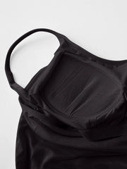 Close view of black cami dress straps and built-in bra cups