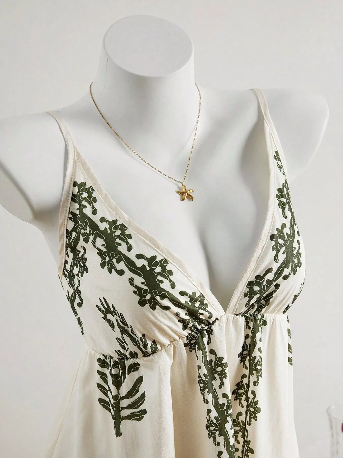 Close view of embroidered bodice and V neckline