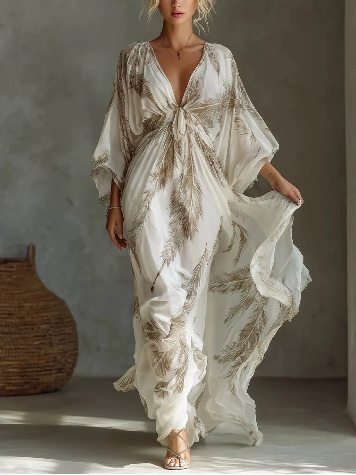 White maxi dress with brown feather print, a tied V-neckline and loose sleeves, full front view.