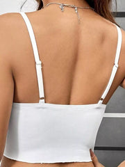 Back view of white crop cami with adjustable straps