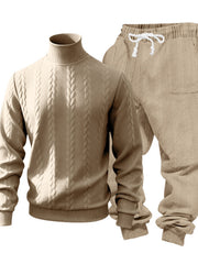Beige cable-knit mock-neck sweater and matching drawstring joggers displayed flat from the front.