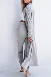 Side view of model wearing gray open-front cardigan with matching lounge pants