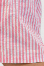 Rose pink striped shorts showing gathered waistband and button placket