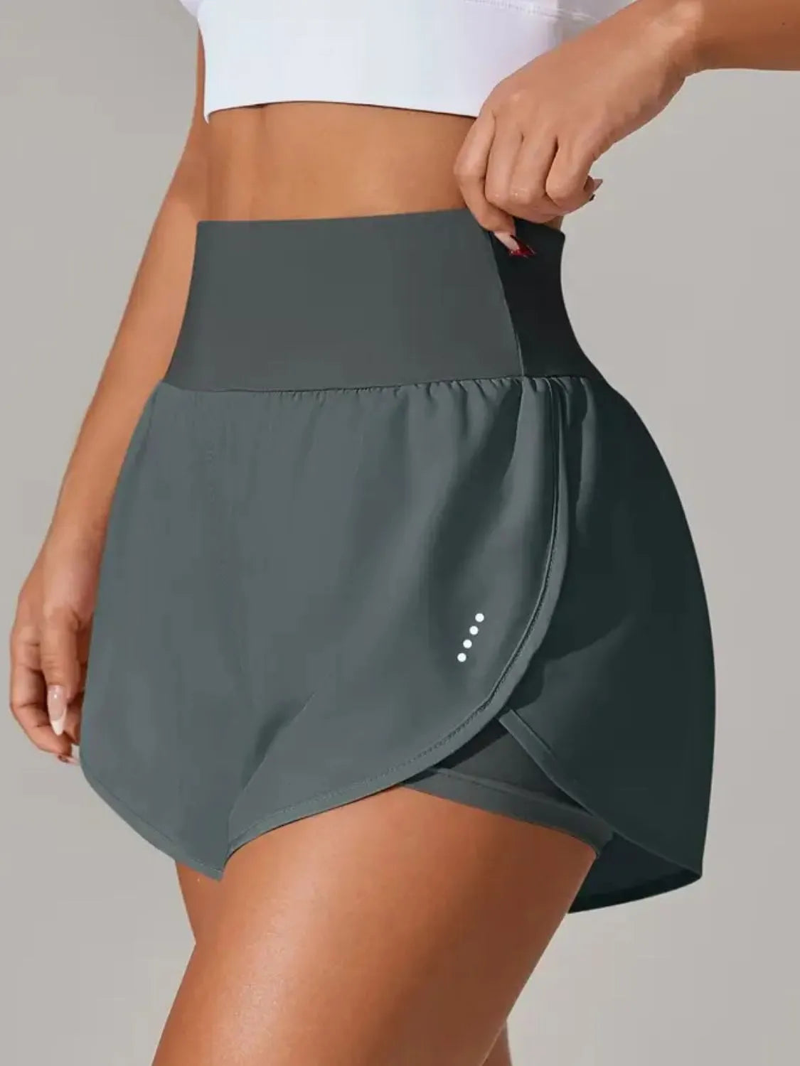 Dark gray running shorts with layered wrap front and wide waistband