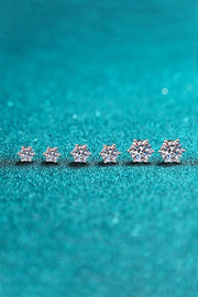 Pair of round moissanite studs shown from the front