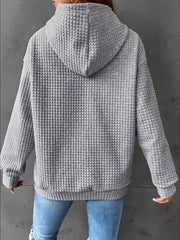 Back view of grey textured hoodie